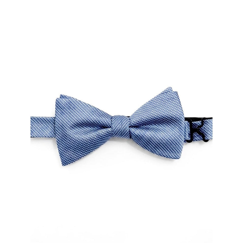 A light blue pre-tied bow tie with a fine white micro-dot pattern, shown against a plain white background. A black elastic band with a white letter 'K' is visible on the right side.