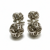 Silver knot cufflinks on a white background