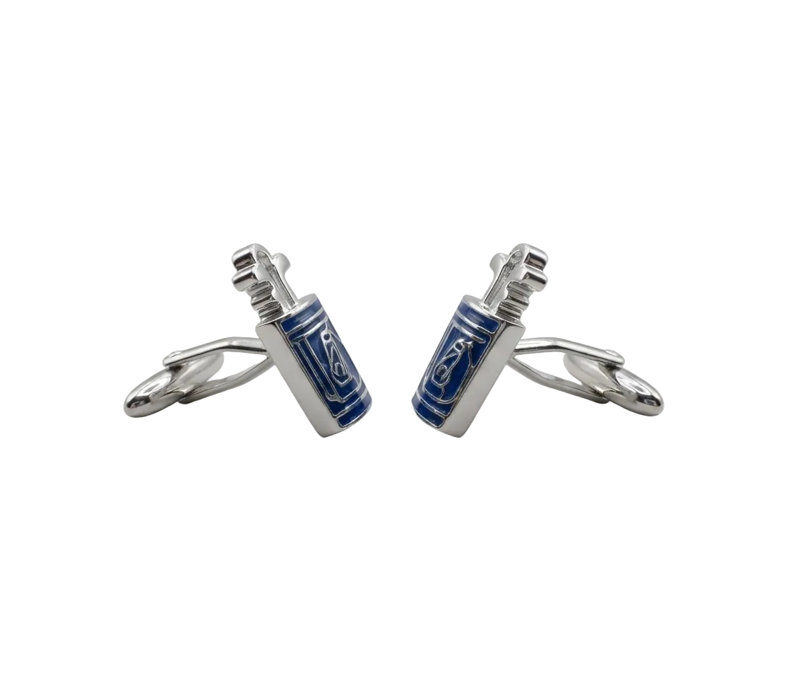 A pair of silver-toned cufflinks with rectangular blue enamel panels featuring white decorative patterns, displayed on a light gray background.